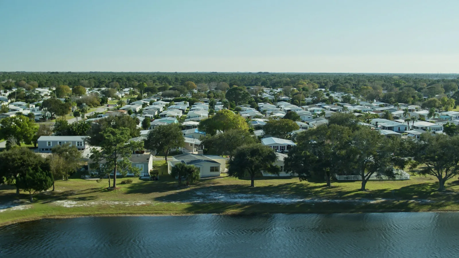 Aerial view of a South Shore neighborhood built around a lake
