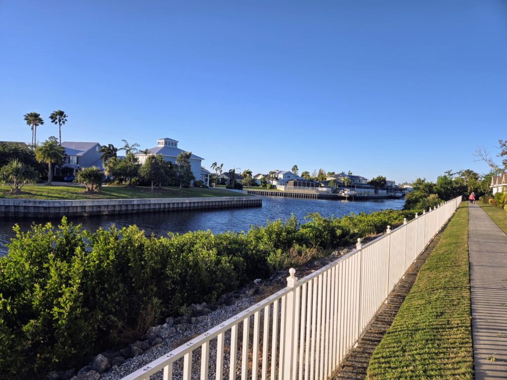 Aerial view of a waterfront community beside open water in Tampa Bay