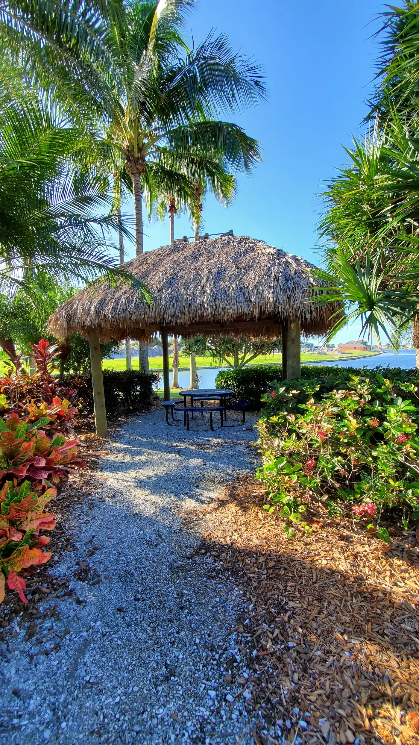 Lakeside tiki hut and picnic shelter in an Apollo Beach community