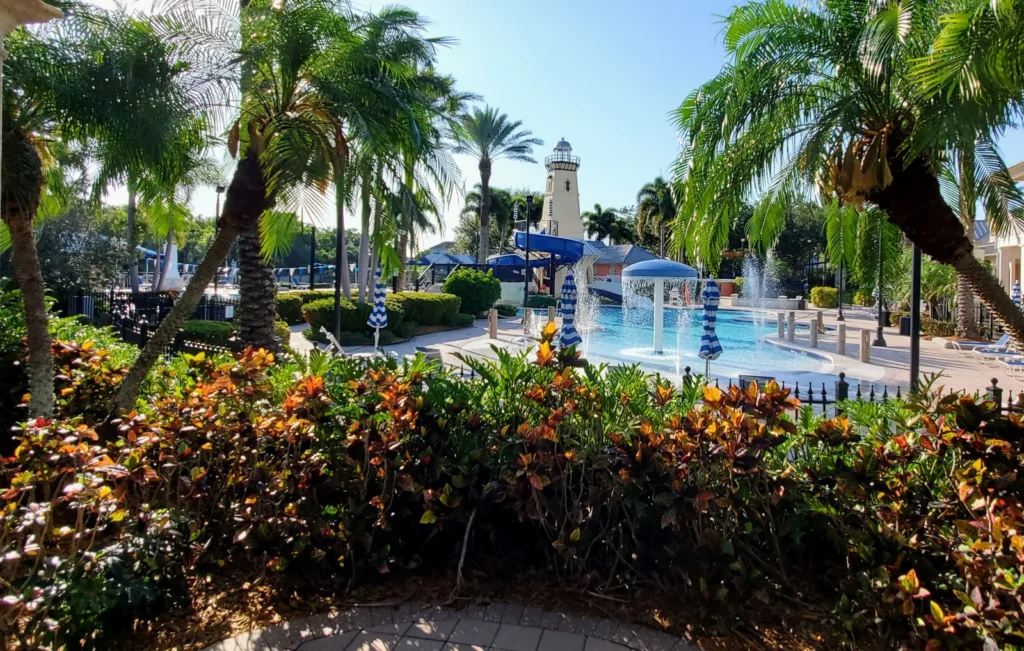 MiraBay's lagoon pool, splash fountains and waterslide below the lighthouse tower