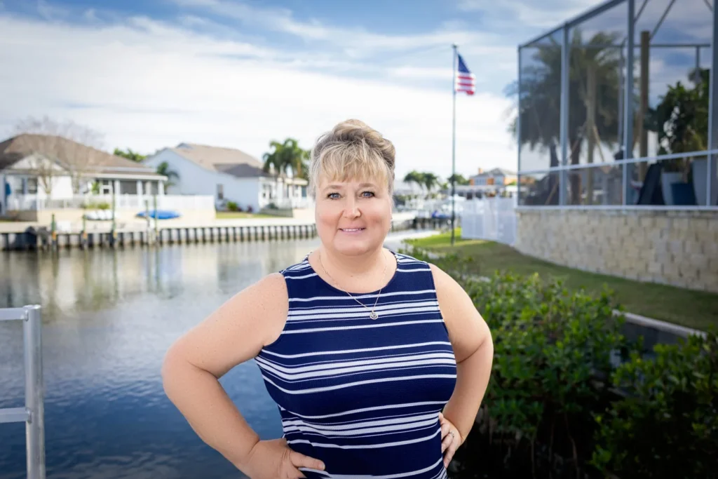 Shawna Calvert, REALTOR with 27North Realty, on an Apollo Beach canal