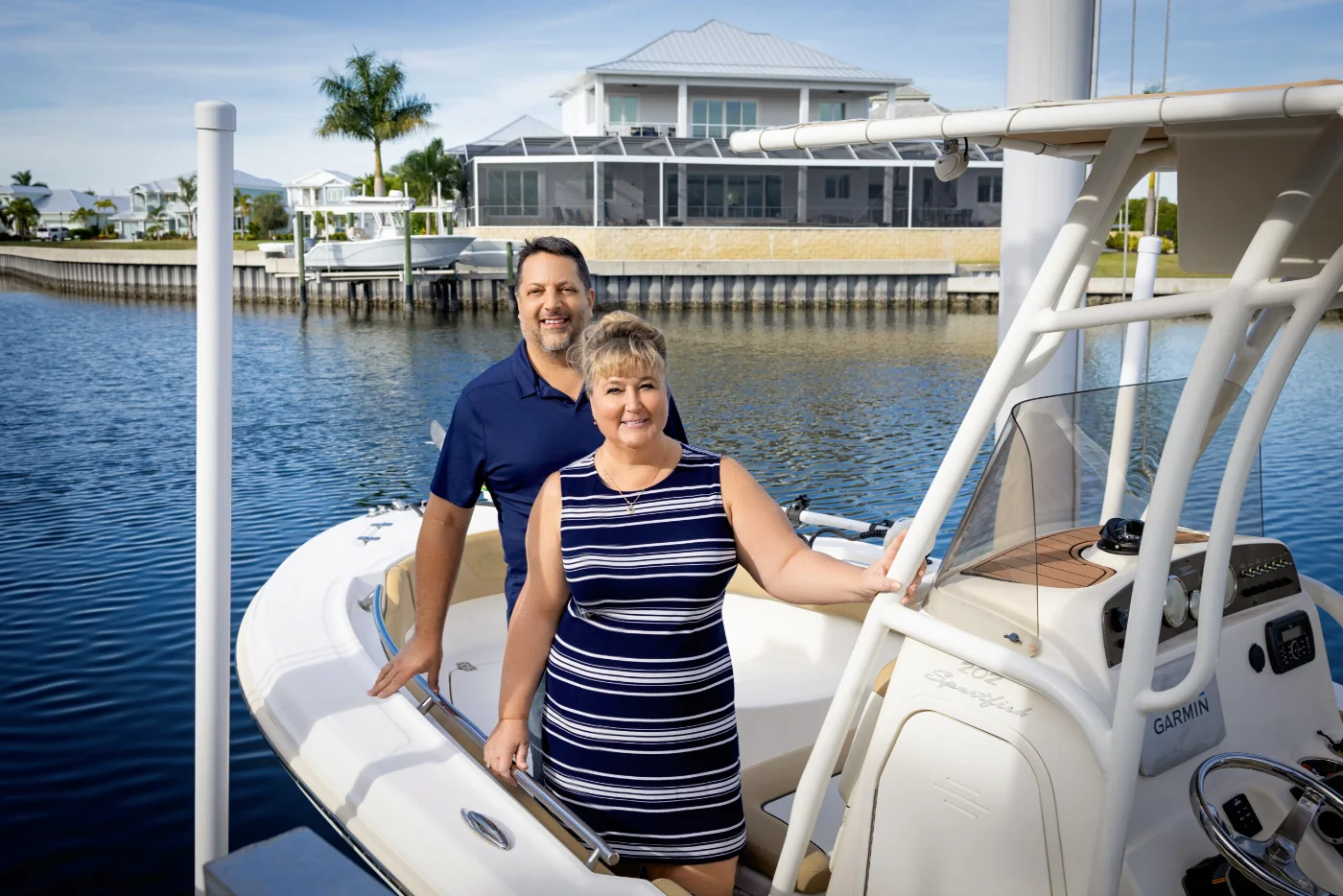 Shawna Calvert on the water off Apollo Beach, with waterfront dining behind
