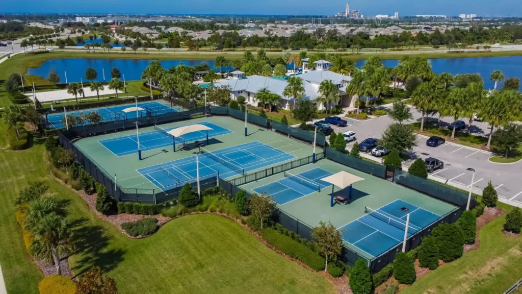Aerial view of a Waterset clubhouse and resort pool in Apollo Beach