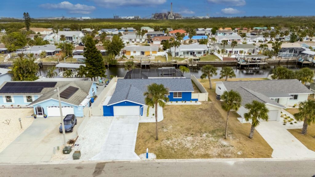 Aerial view of the no-HOA waterfront home at 1011 Spindle Palm Way in Apollo Beach, Florida