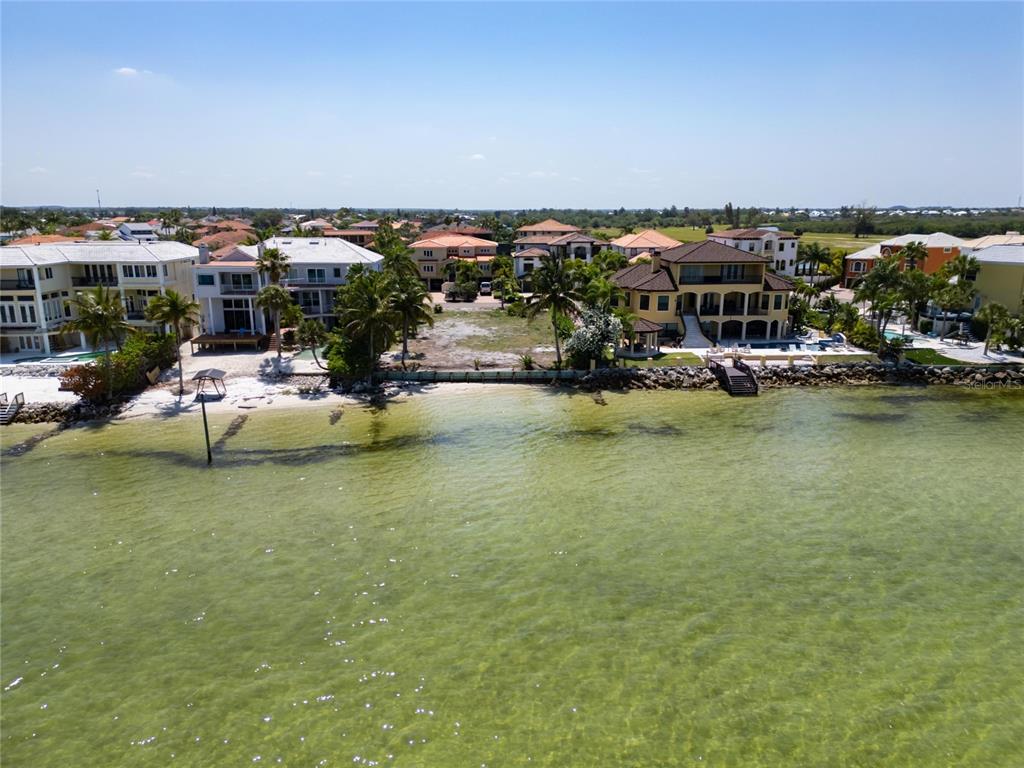 Aerial of the Tampa Bay shoreline at 1013 Symphony Isles Boulevard, Apollo Beach