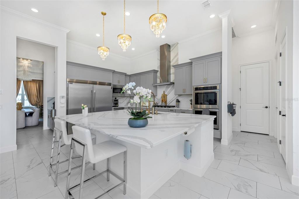 Open kitchen with large island at 1016 Signet Drive, MiraBay