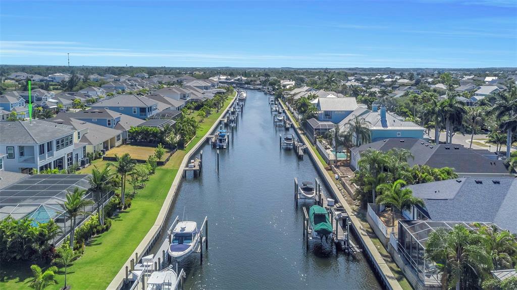 Aerial of the saltwater canal behind 1016 Signet Drive leading toward Tampa Bay