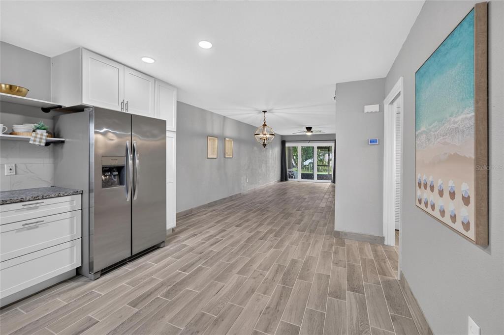 Renovated kitchen with granite and plywood cabinets