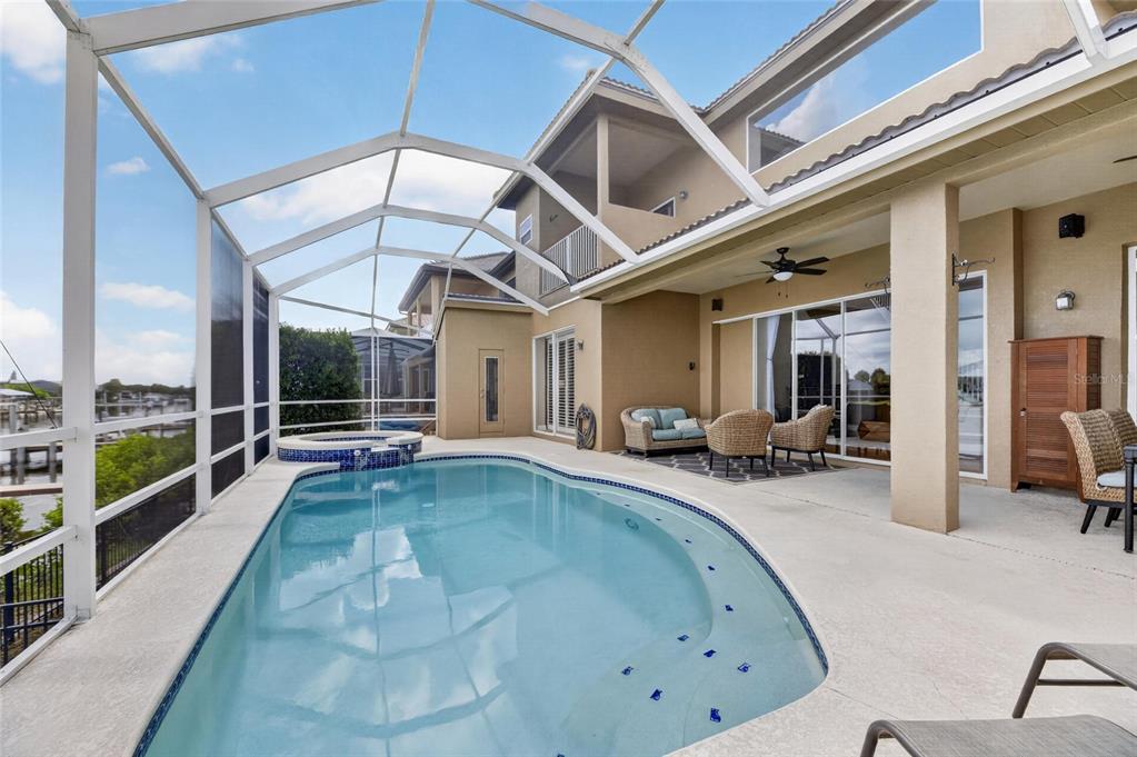 Propane-heated spa beside the pool