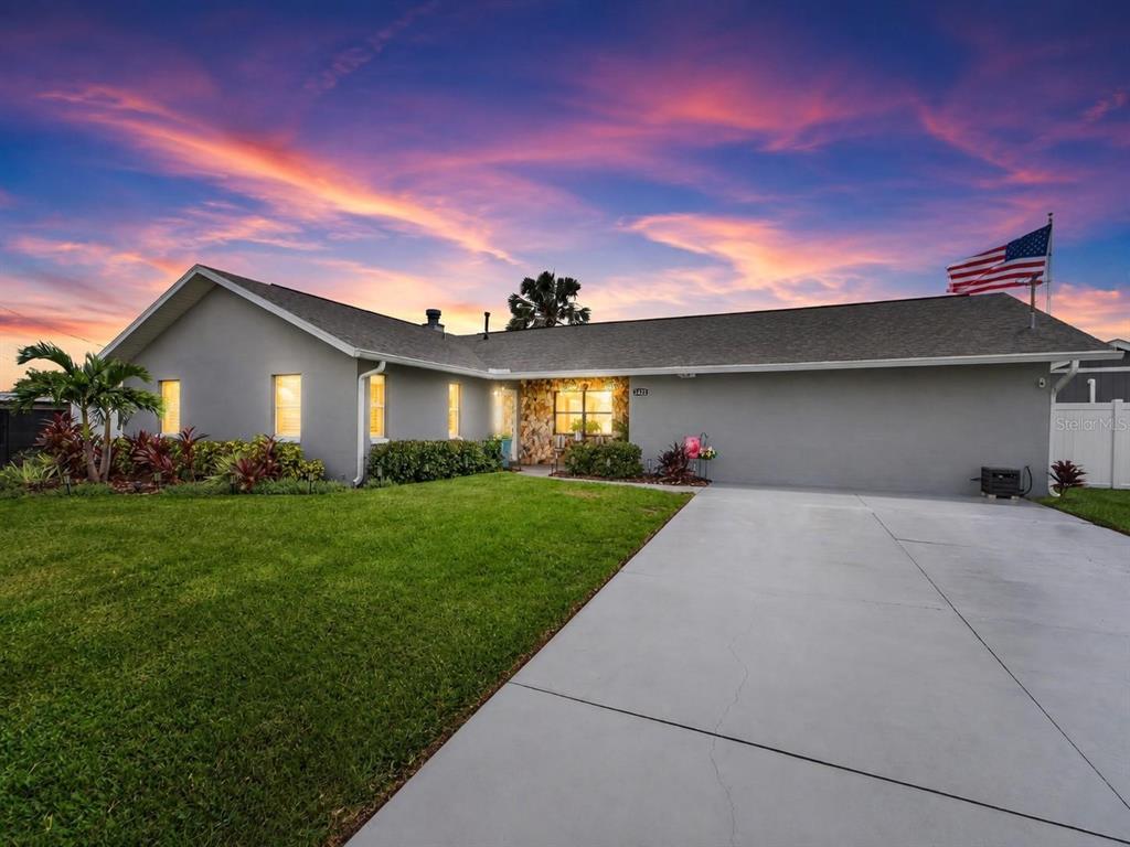 Sunset over the home at 3422 W Shell Point Road