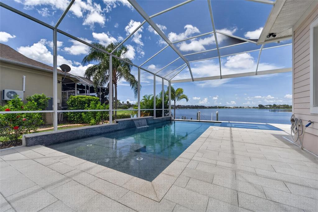 Pool and spa overlooking the MiraBay lagoon at 429 Manns Harbor Drive, Apollo Beach