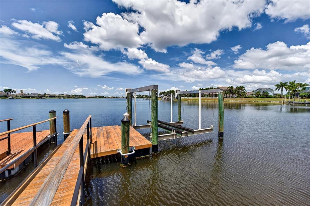 Deeded dock with 13,000-pound boat lift on the MiraBay lagoon