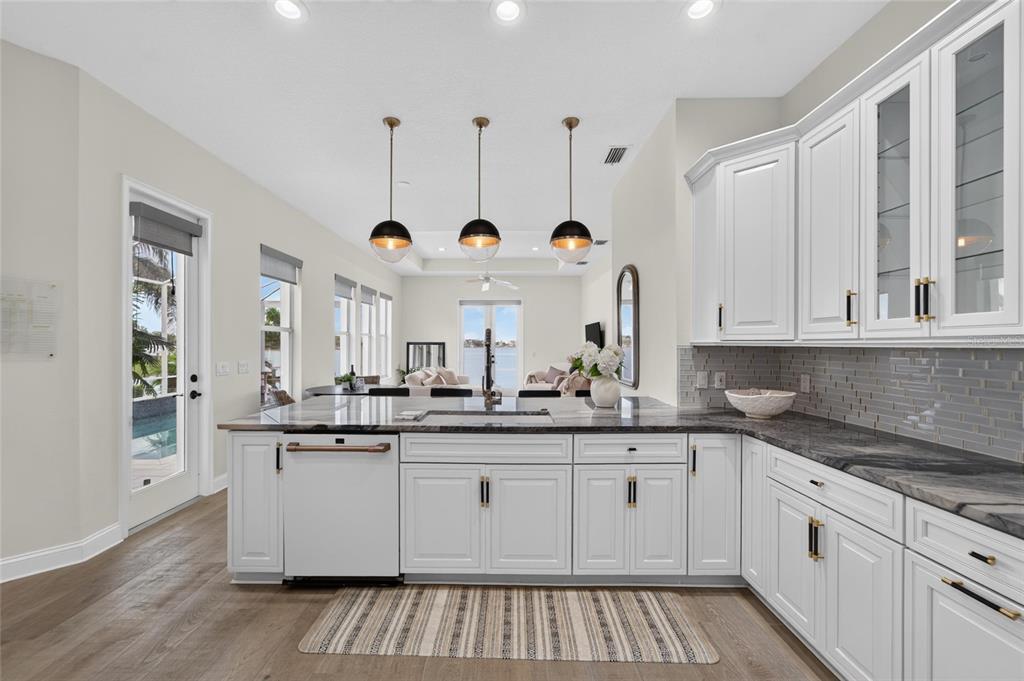 Remodeled kitchen with solid-wood cabinets and quartz island