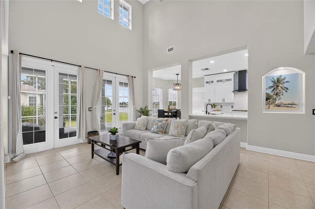 Family room with soaring ceilings and skylights