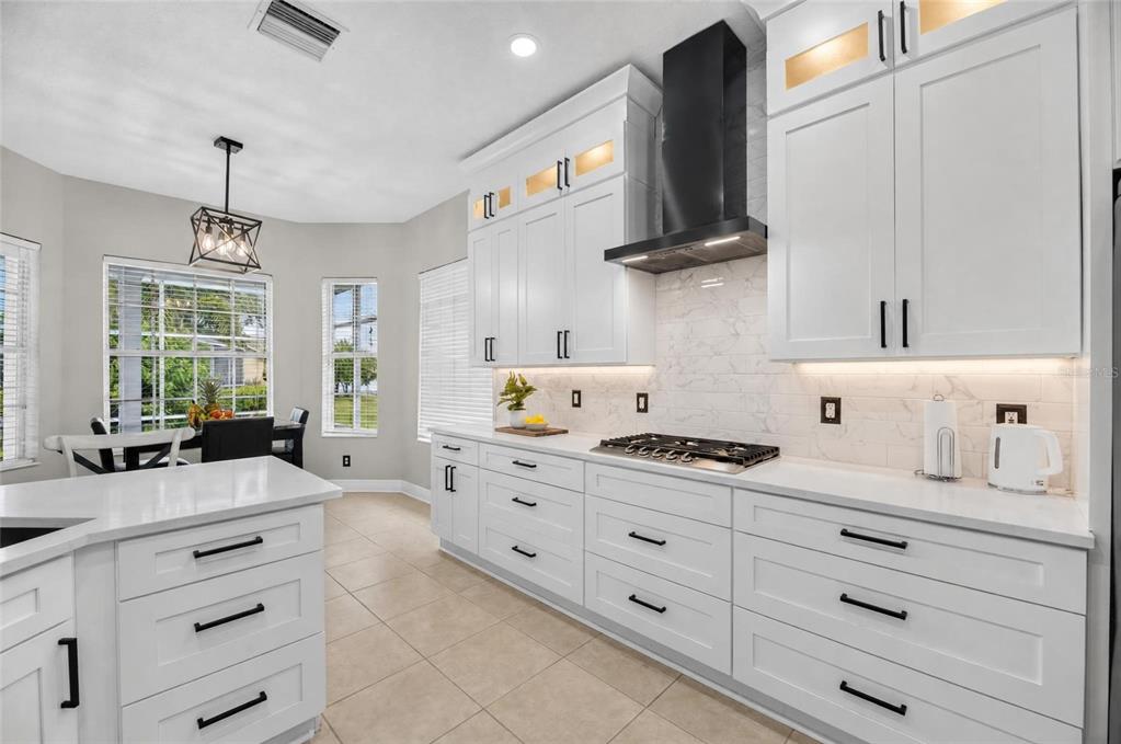 Remodeled kitchen with quartz counters