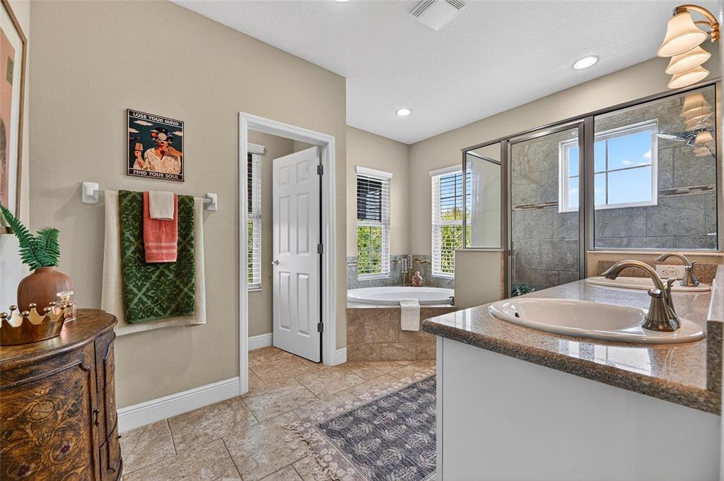 Primary bath with dual vanities and soaking tub