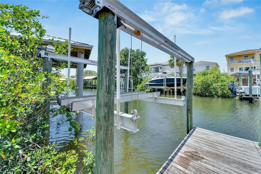 Private dock and boat lift behind 517 Treviso Drive, Apollo Beach