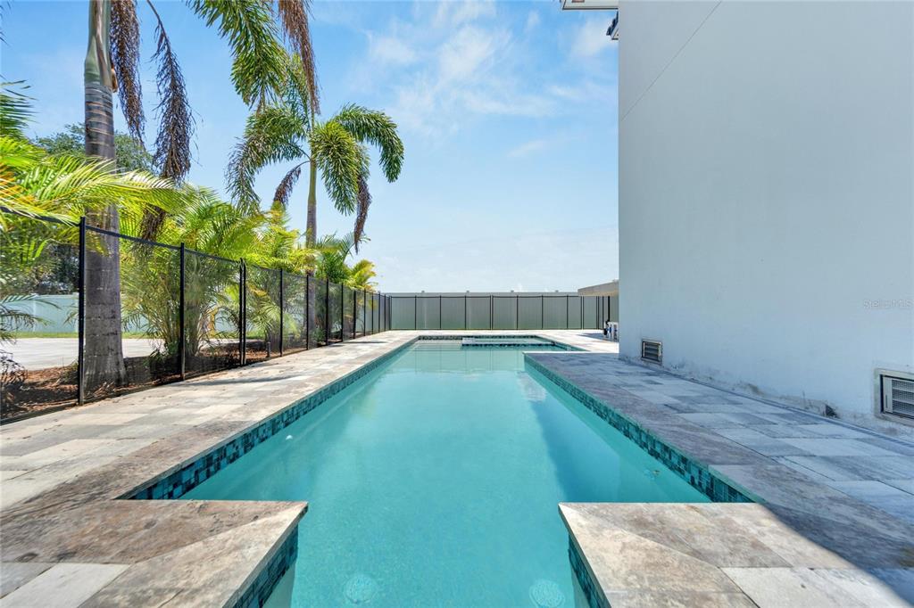 Heated in-ground pool at 517 Treviso Drive, Apollo Beach