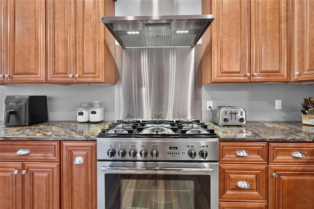 36-inch AGA dual-fuel range and Thermador exhaust