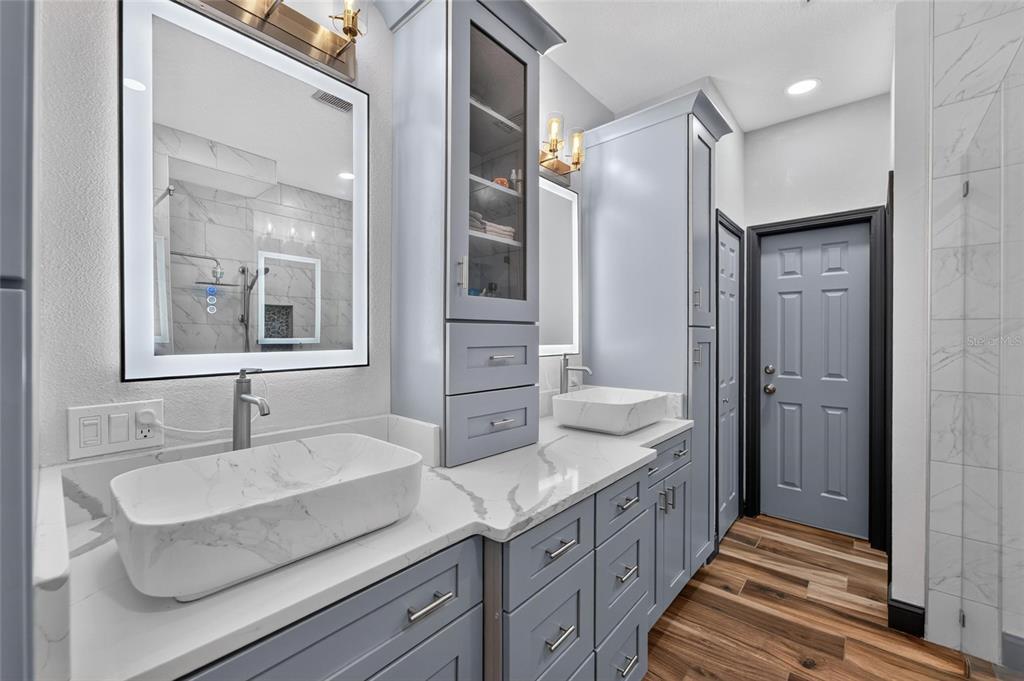Remodeled primary bath with oversized walk-in shower