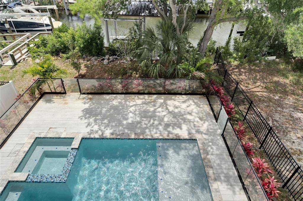 Pool and spa with outdoor living at 534 Estuary Shore Lane