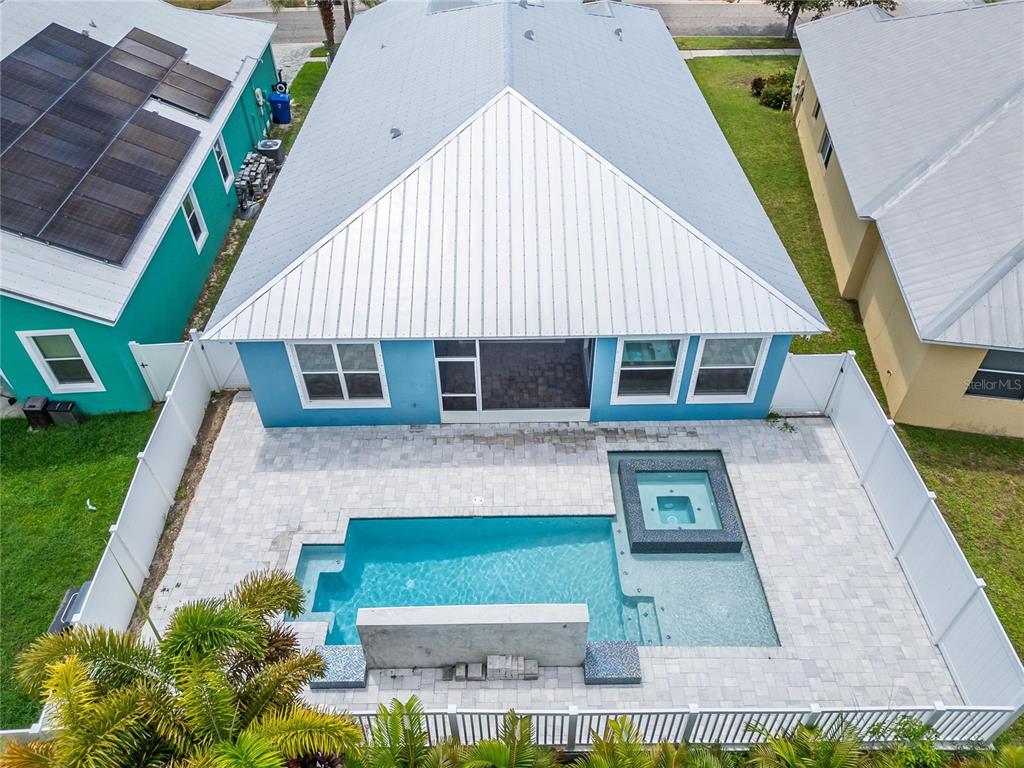 Aerial view of the heated pool and spa at 567 Bimini Bay Boulevard, Apollo Beach