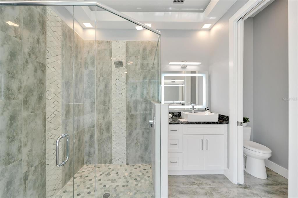 Primary bath with soaking tub and oversized shower