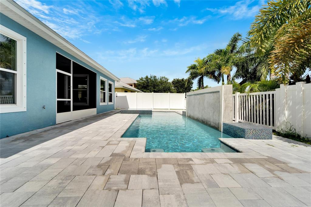 Heated pool with water features