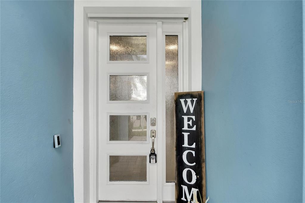 Glass-etched front door and foyer