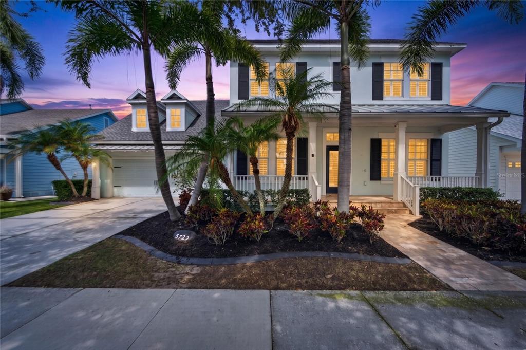 Front of 5722 Sea Trout Place at dusk