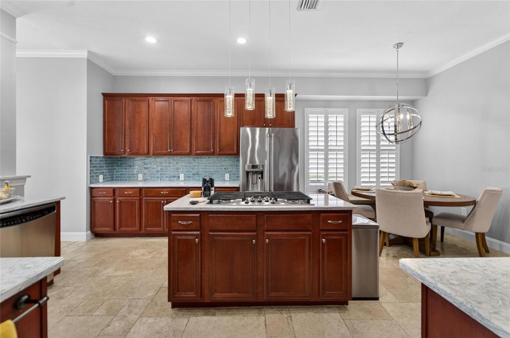 Kitchen with quartz counters and island