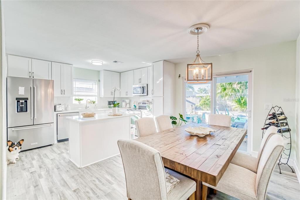 2023 kitchen with granite and stainless appliances