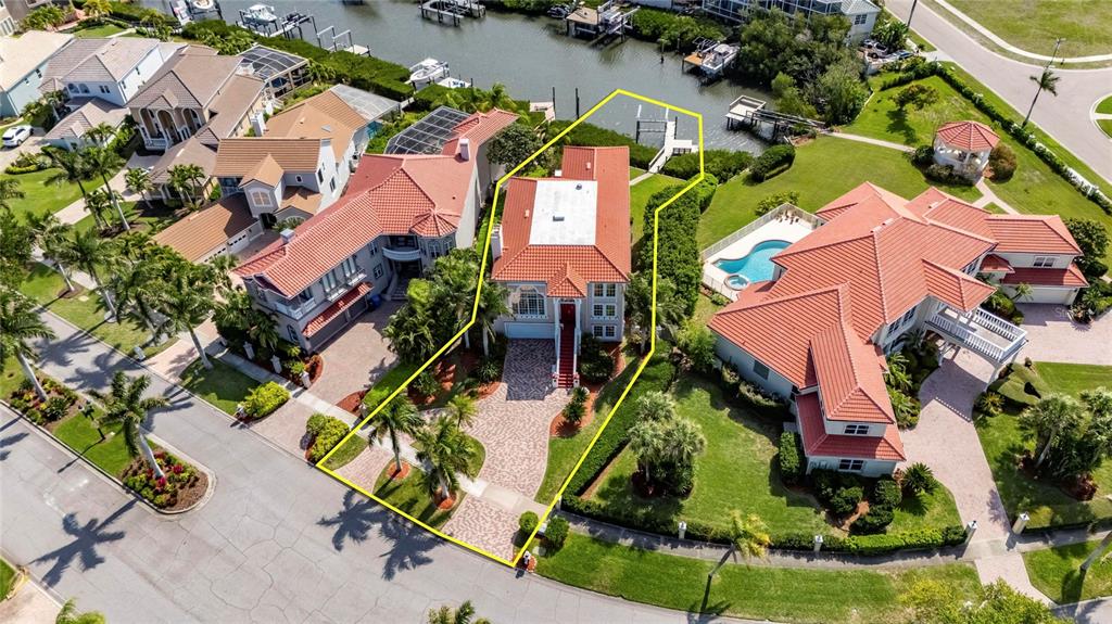 Andalucia clubhouse, pool and tennis courts across the street