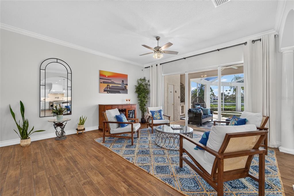 Family room with marble ledger stone wall at 6203 Marbella Boulevard