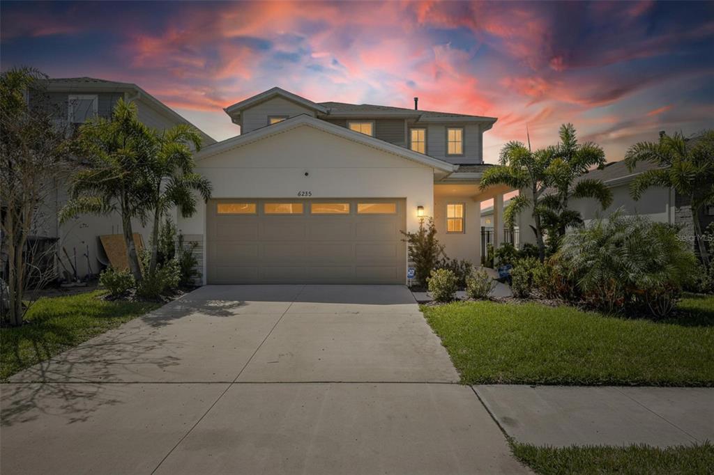 Front of 6255 Golden Beach Drive at dusk, Waterset, Apollo Beach