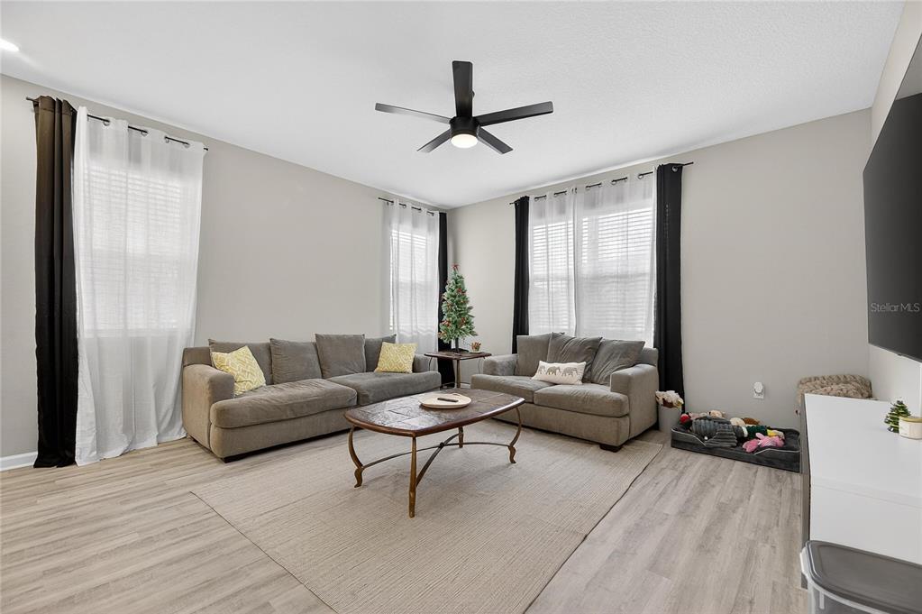 Main living room with high ceilings