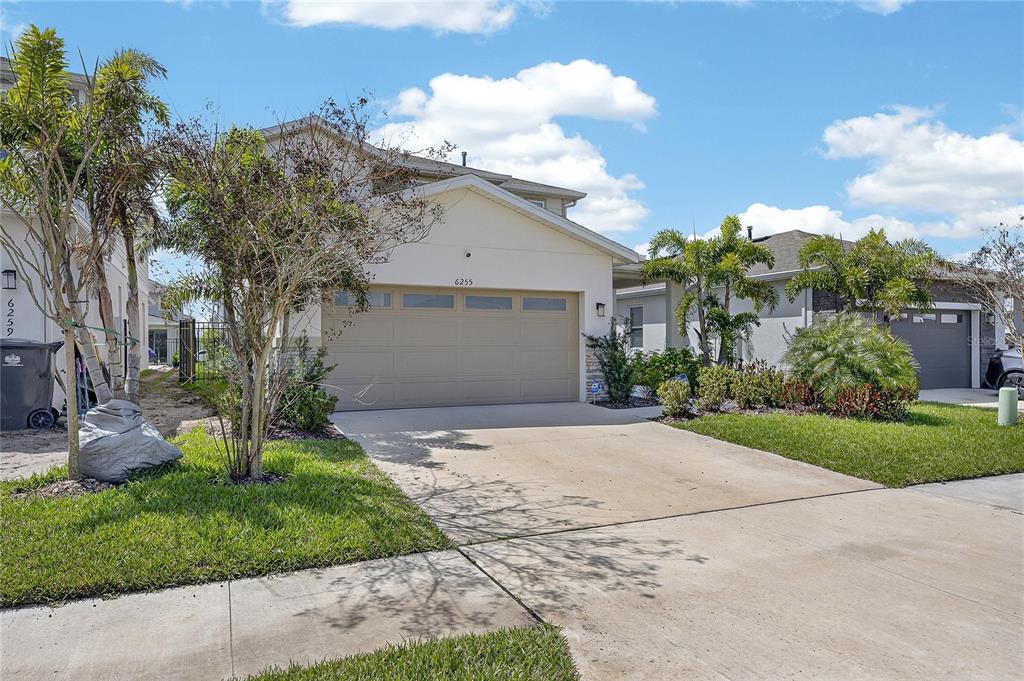 Front porch and 2-car garage
