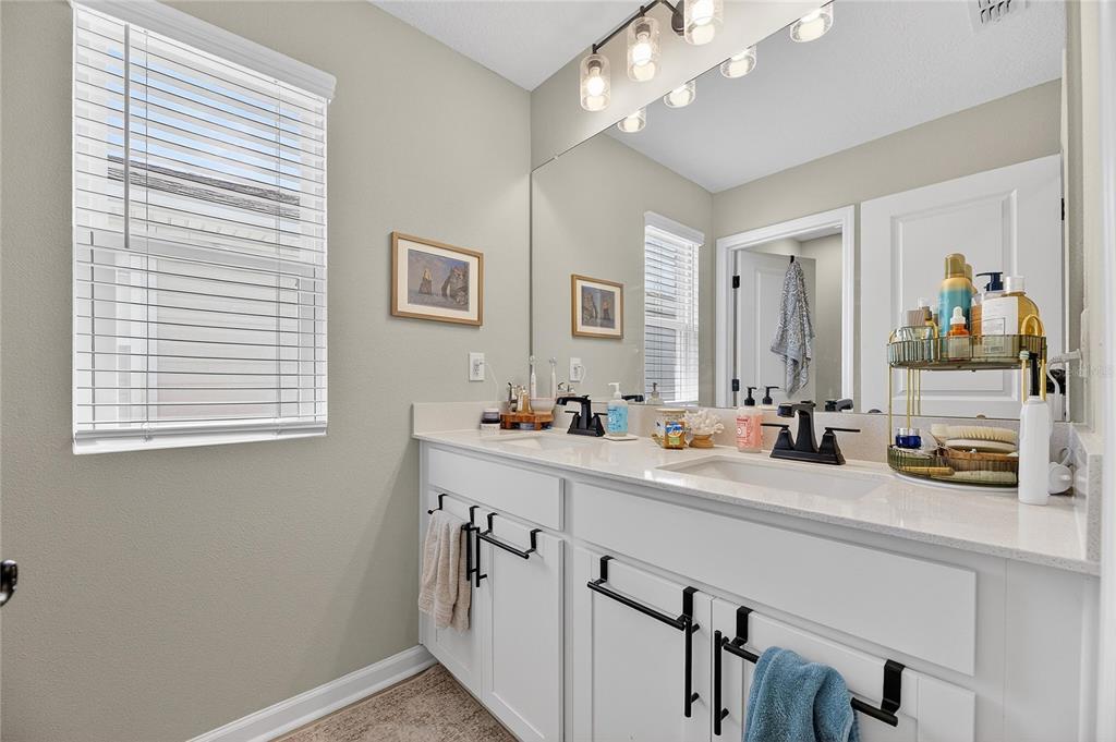 Primary bath with dual sinks and separate shower