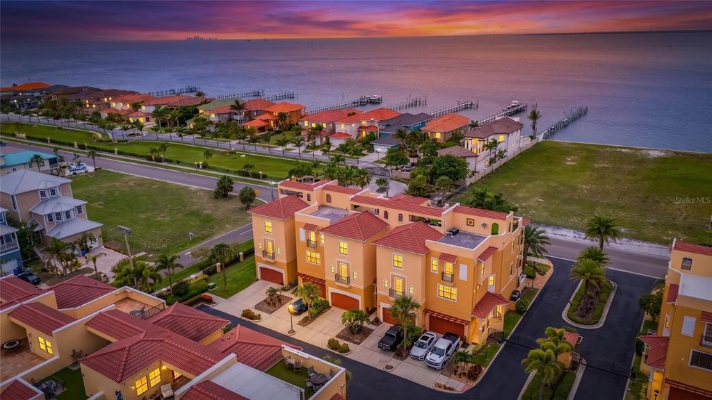 Aerial sunset view of Brisa Del Mar townhomes on Tampa Bay, Apollo Beach