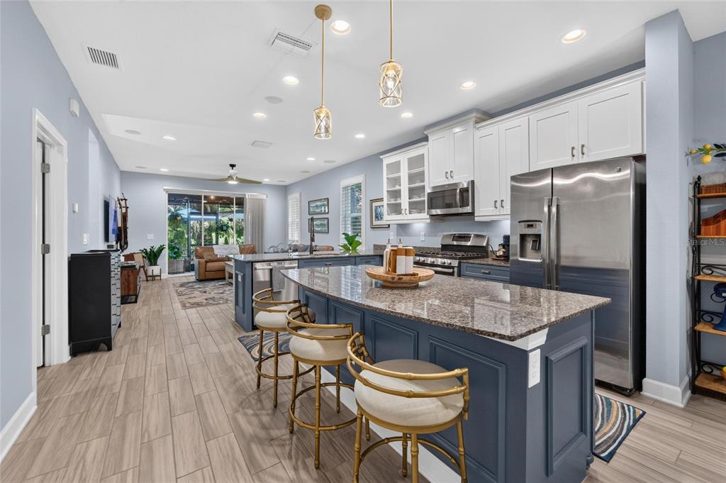 Kitchen with granite counters and island