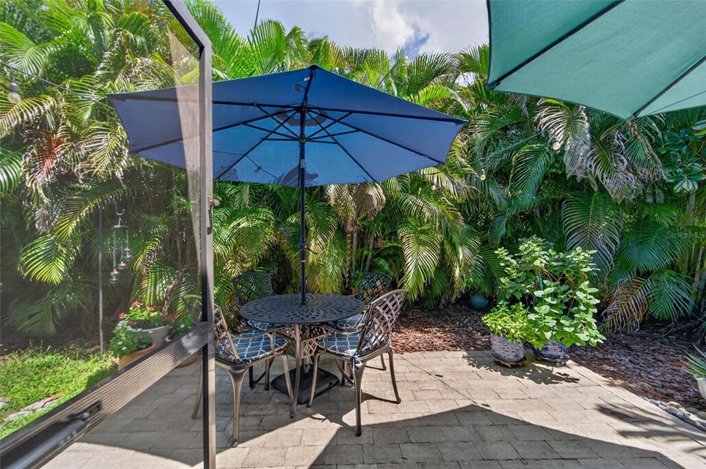 Patio and landscaped fenced yard