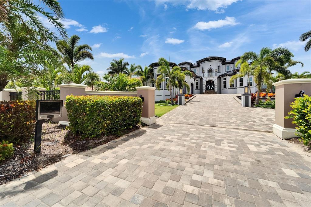 Front entry and motor court at 6526 Surfside Boulevard