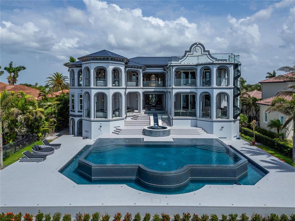 Pool and front elevation of 6526 Surfside Boulevard, Apollo Beach