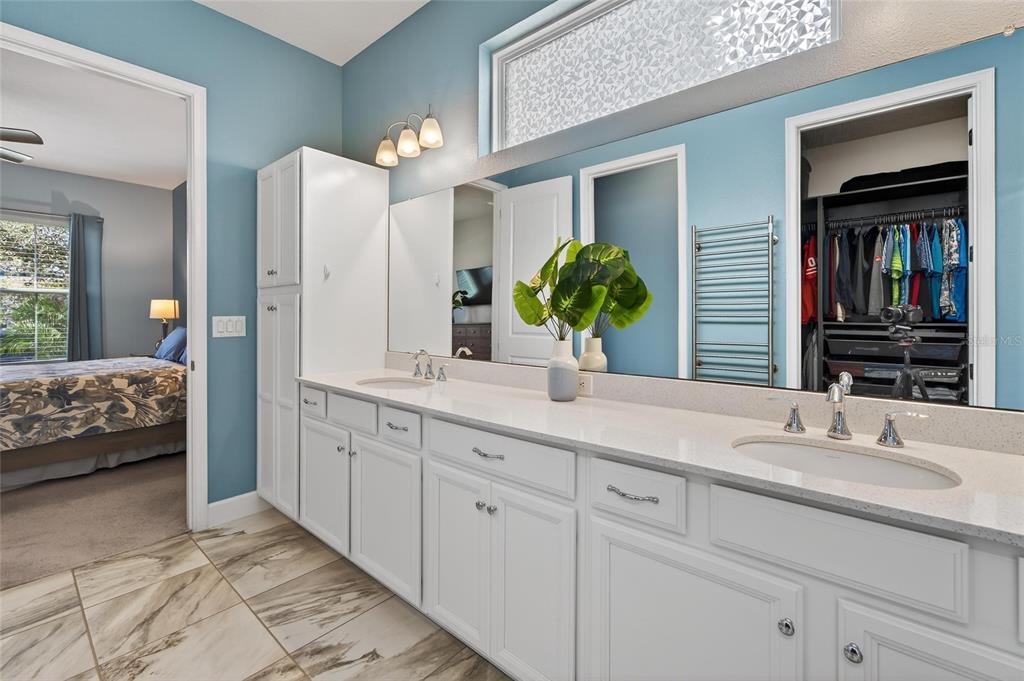 Primary shower with bench and dual shower heads