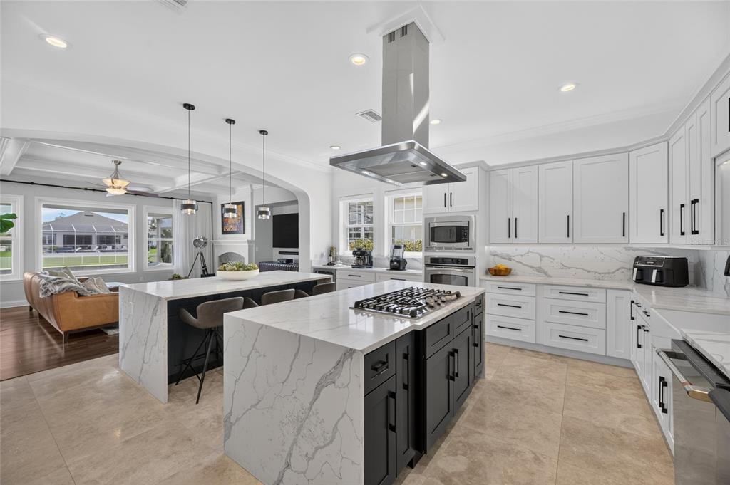 Remodeled kitchen with dual islands and gas cooktop at 713 Islebay Drive