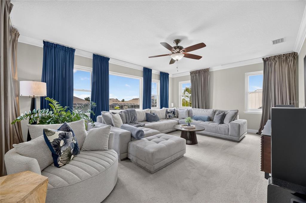 Upstairs theater and bonus room at 713 Islebay Drive