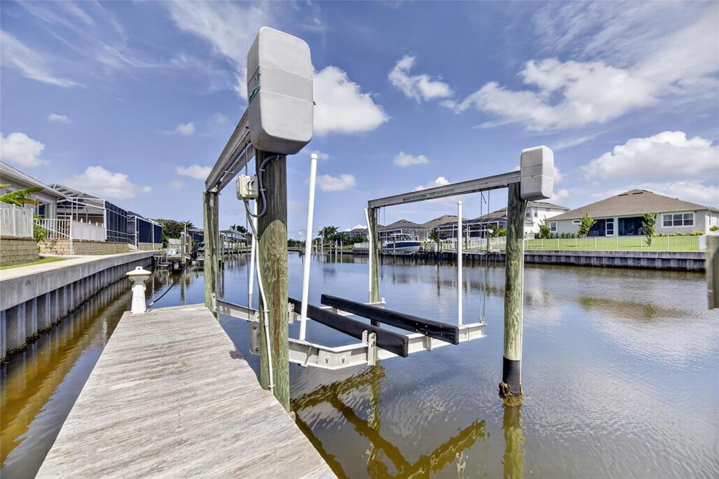 Private deeded dock and 10,000 pound boat lift on Biscayne Canal