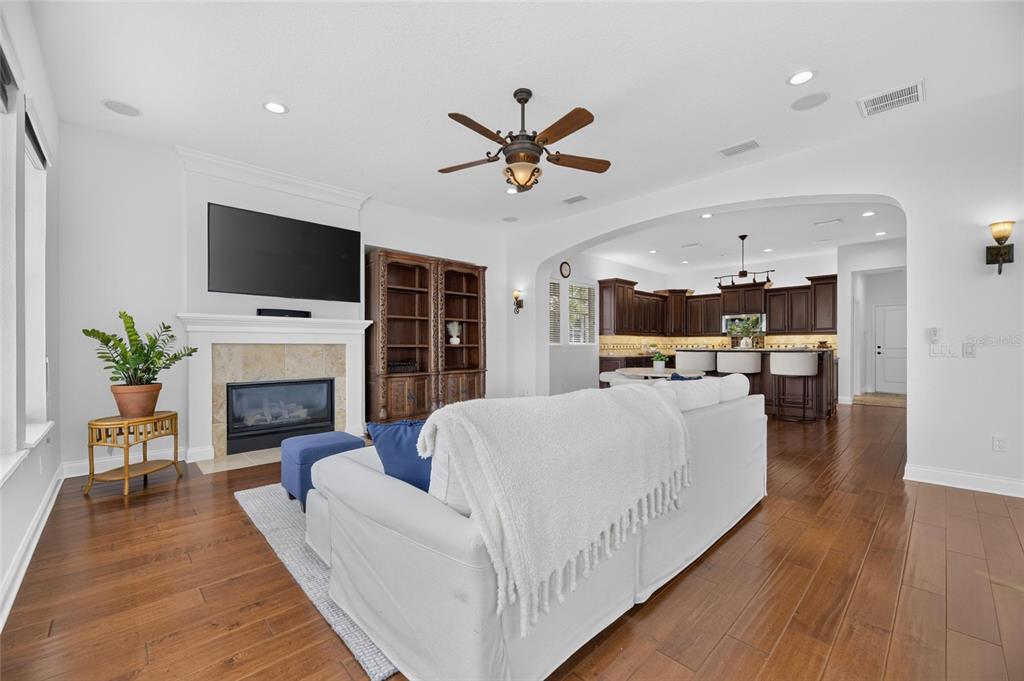 Family room with gas fireplace and built-ins at 715 Islebay Drive