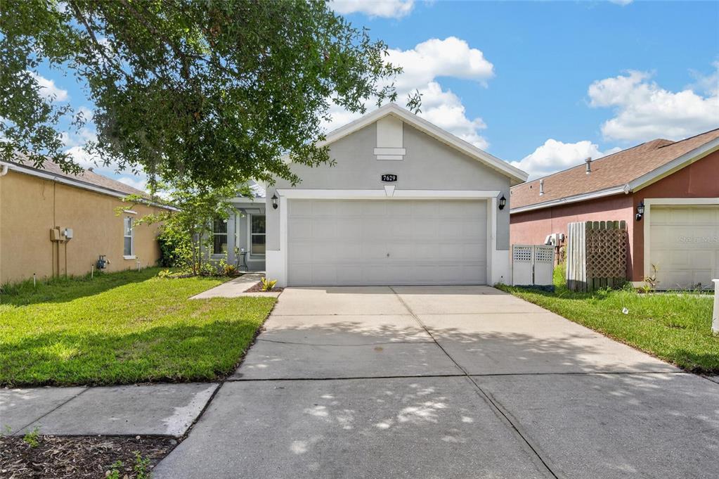 Front of 7629 Devonbridge Garden Way in Covington Park, Apollo Beach
