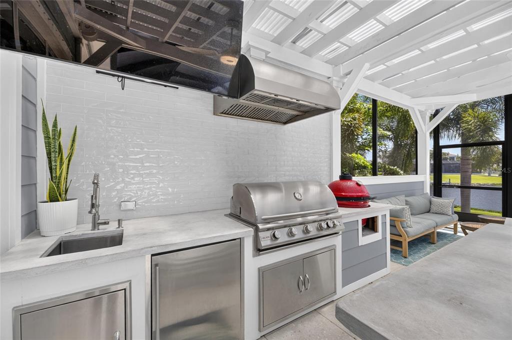 Outdoor kitchen on the covered lanai at 825 Manns Harbor Drive